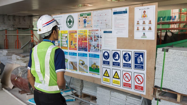 employee watching the safety procedure on a board