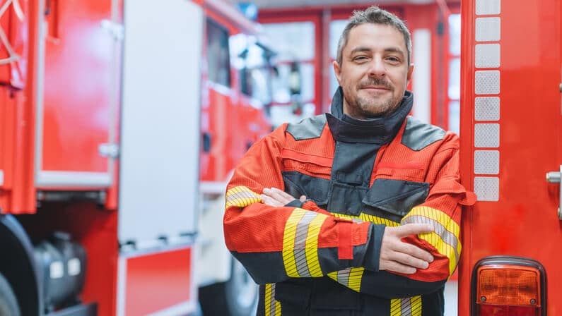 smiling male fire fighter